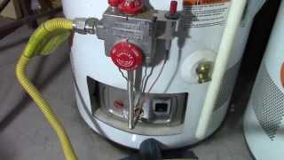 How to relight a water heater pilot light [upl. by Mackie]